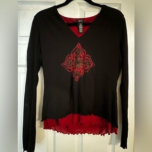 Que long sleeve top